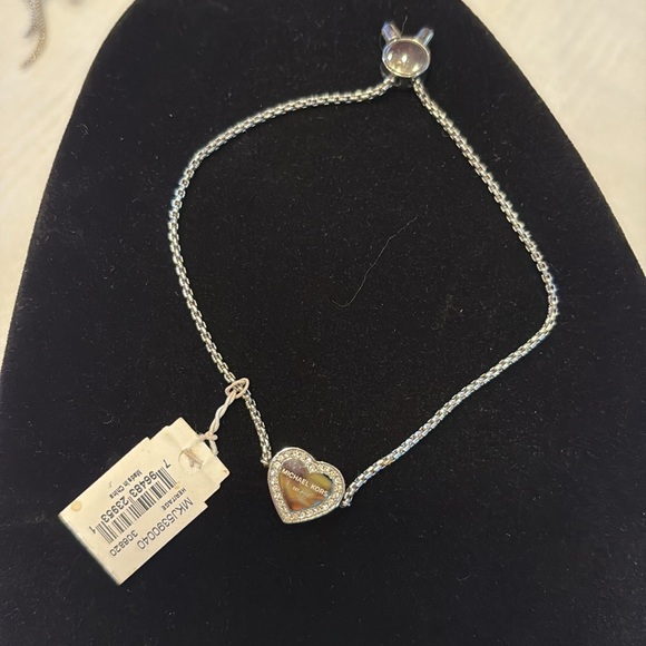 Michael Kors Silver Tone Heritage Pave Clear Rhinestone Logo Heart Bracelet - Picture 6 of 10